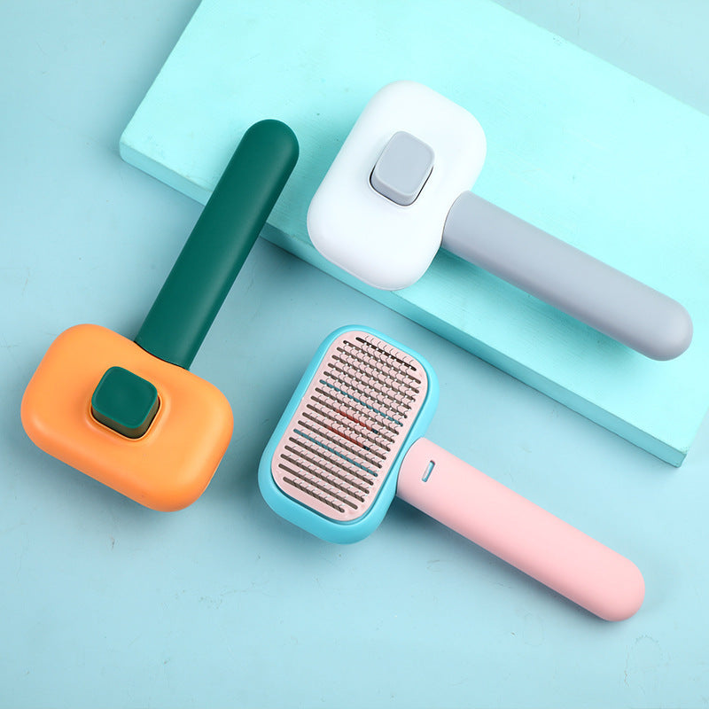 Brosse pour chats et chiens en acier inoxydable pour le toilettage, l'élimination des nœuds et le massage