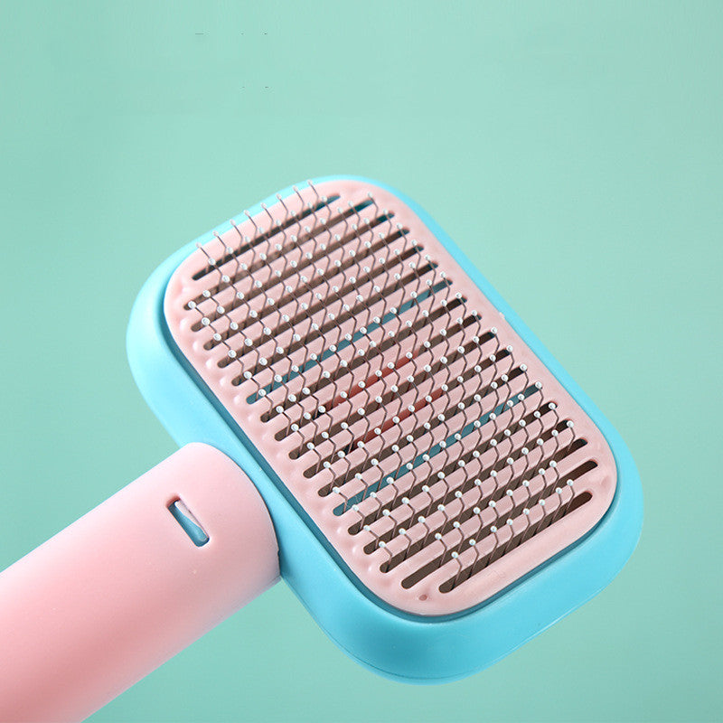 Brosse pour chats et chiens en acier inoxydable pour le toilettage, l'élimination des nœuds et le massage